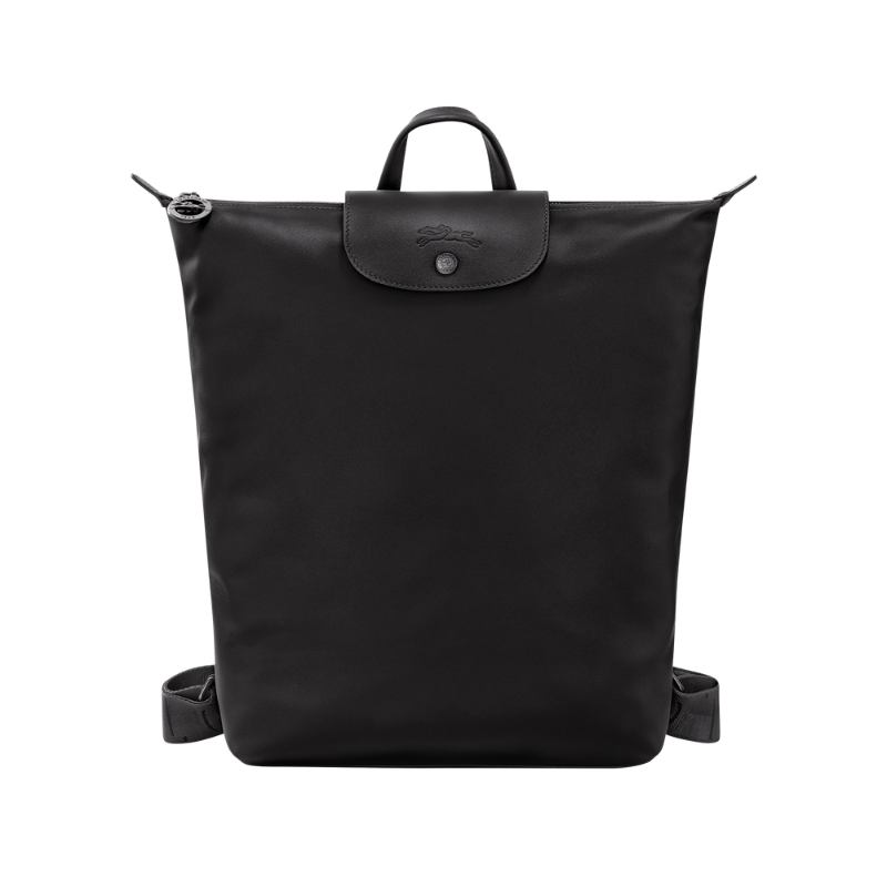 Black leather backpack, front view on white background