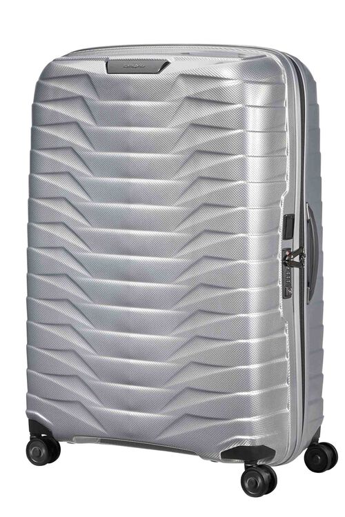 Silver suitcase with a textured pattern on a white background