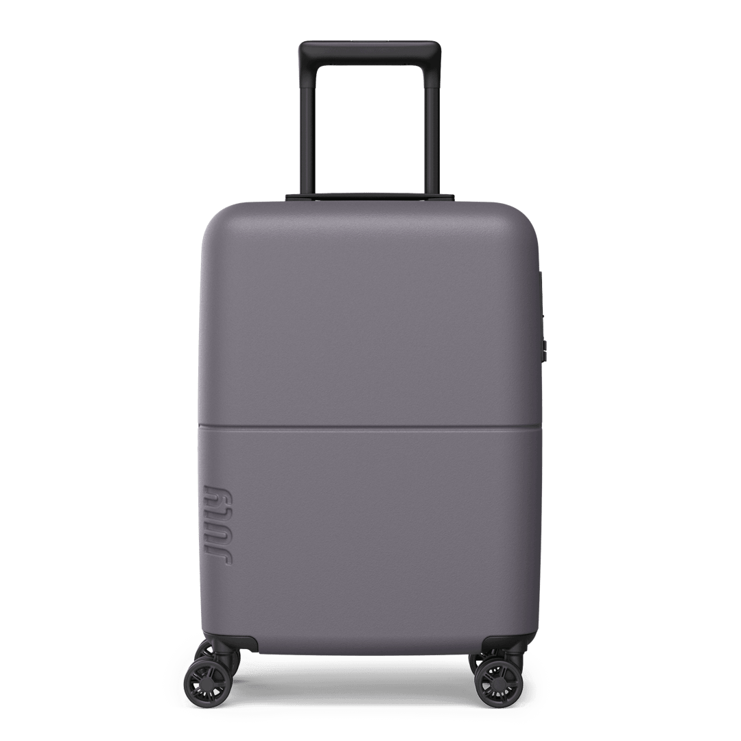 Light expandable carry-on luggage, front view on white background