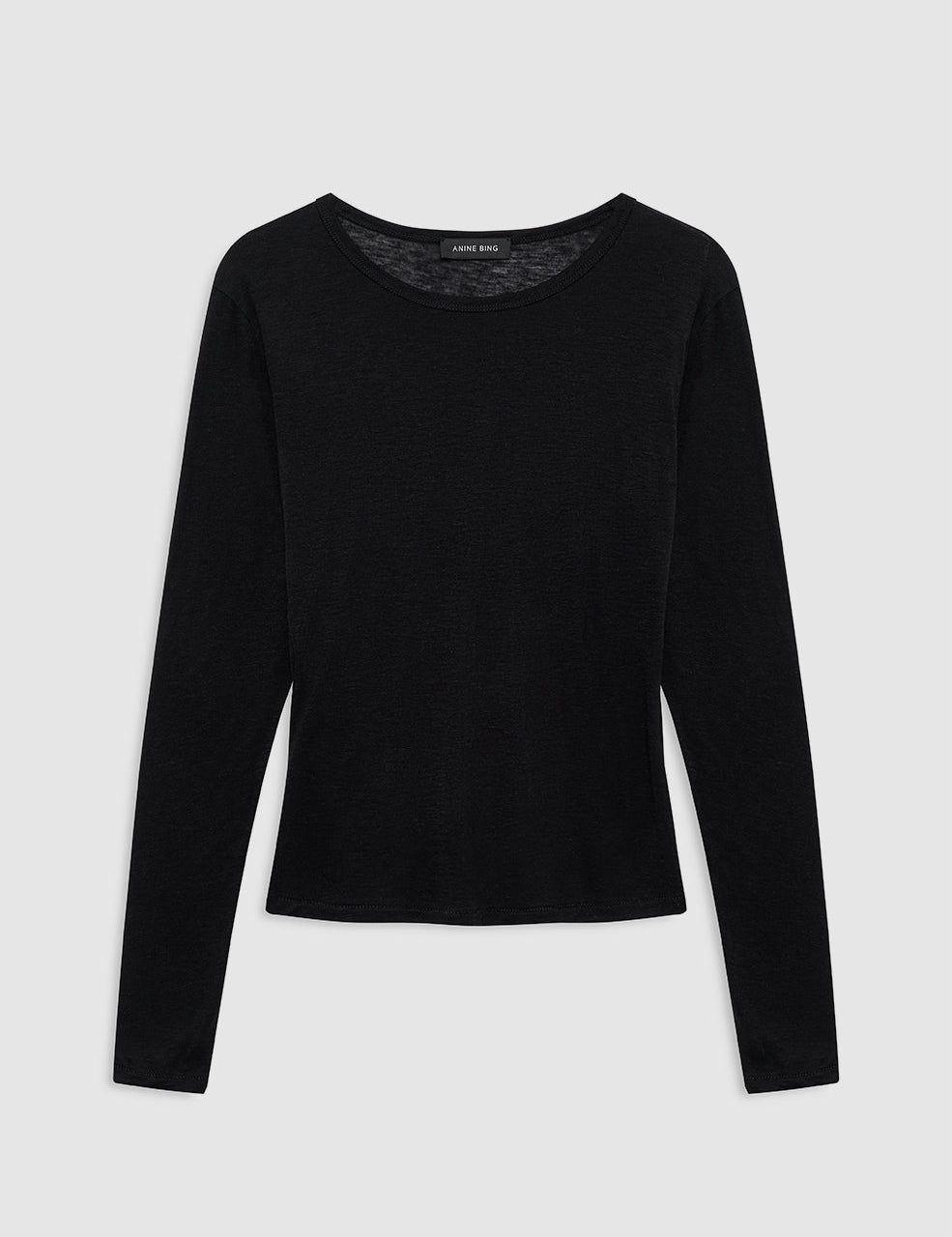 Model wearing Anine Bing Sylvie Long Sleeve Tee in black