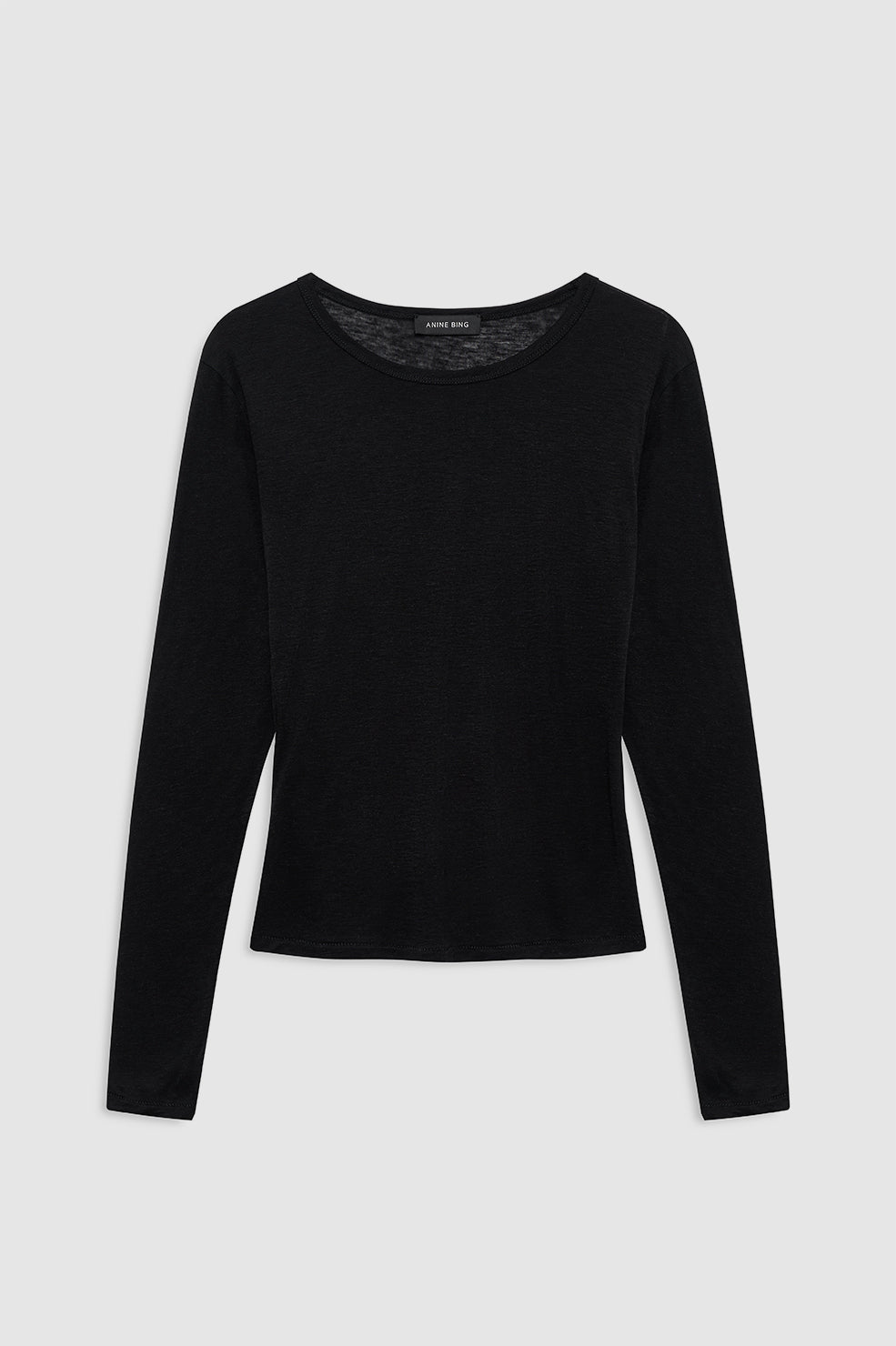 Model wearing Anine Bing Sylvie Long Sleeve Tee in black