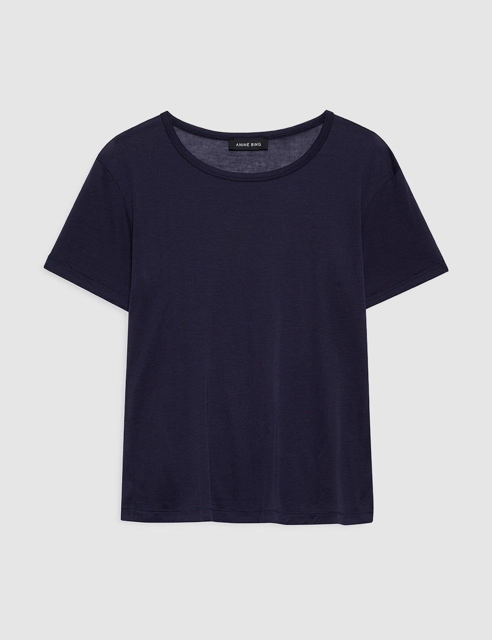 Model wearing Anine Bing Sylvie Tee in navy