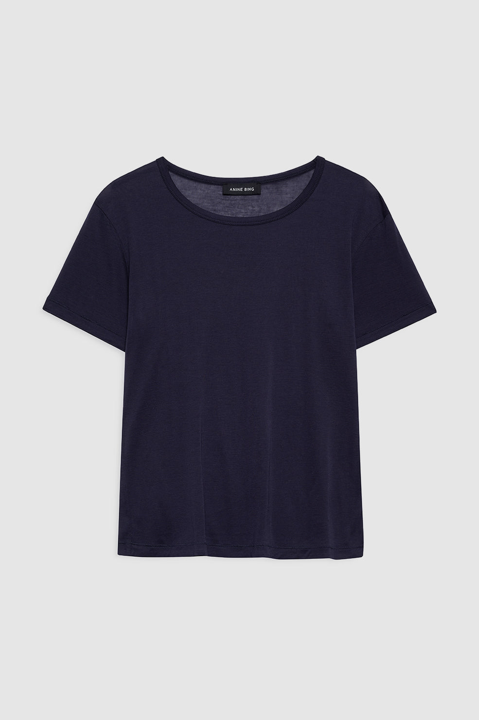 Model wearing Anine Bing Sylvie Tee in navy