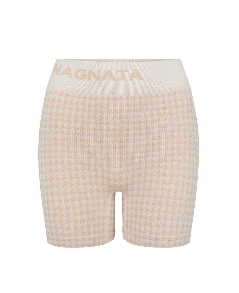 Nagnata Houndstooth Wool Mini Short in white on a white background