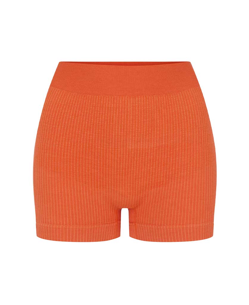 Nagnata Classic Micro Wool Mini Short in papaya on a white background
