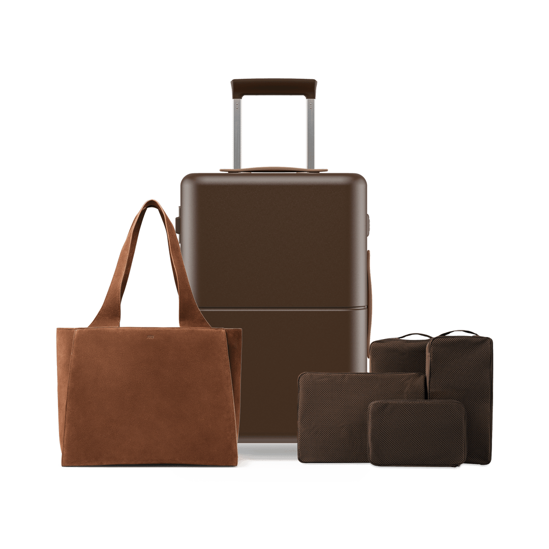 Mixed fashion luggage set in multiple colourways, front view on white background