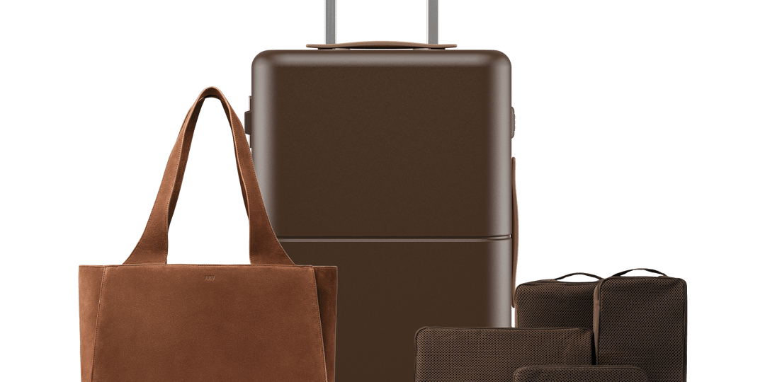 Mixed fashion luggage set in multiple colourways, front view on white background