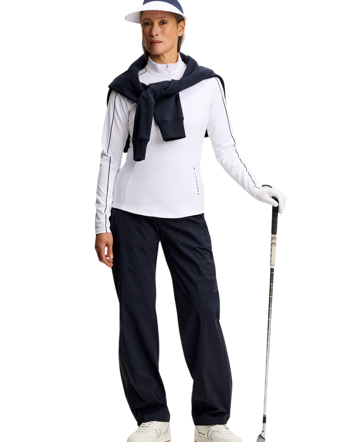 Model wearing J.Lindeberg Adiola Quarter Zip Mid Layer in white