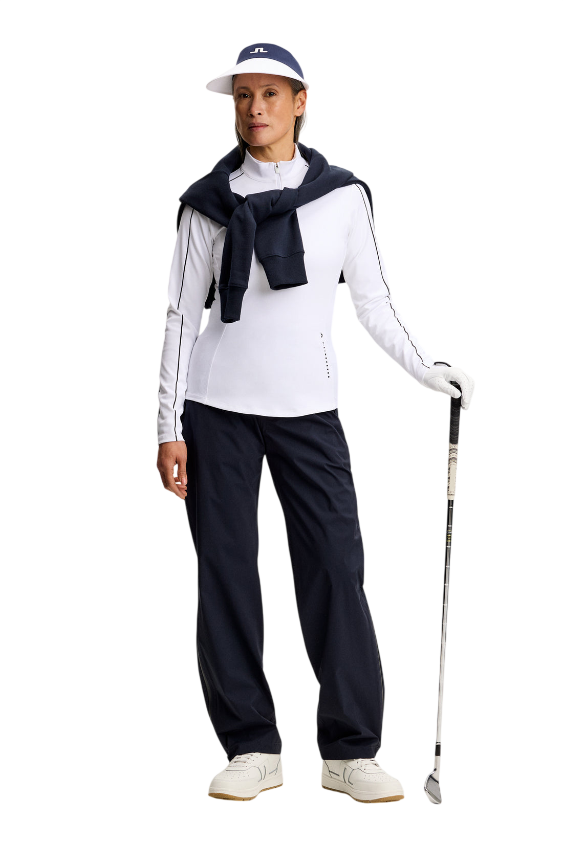 Model wearing J.Lindeberg Adiola Quarter Zip Mid Layer in white