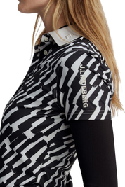 Model wearing J.Lindeberg Tour Tech Print Polo