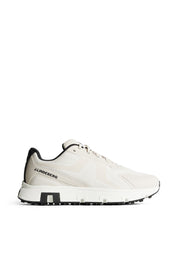 White sneaker with black accents on a white background