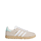 Beige Adidas sneaker with white stripes on a light gray background