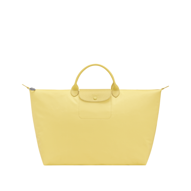 Red travel bag, front view on white background