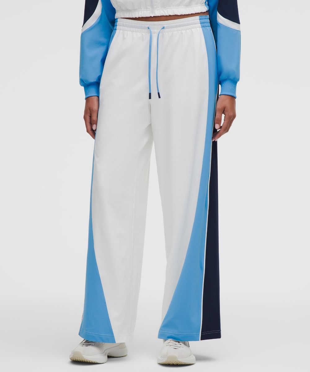 Dark Olive high-rise tennis pant, front view on white background