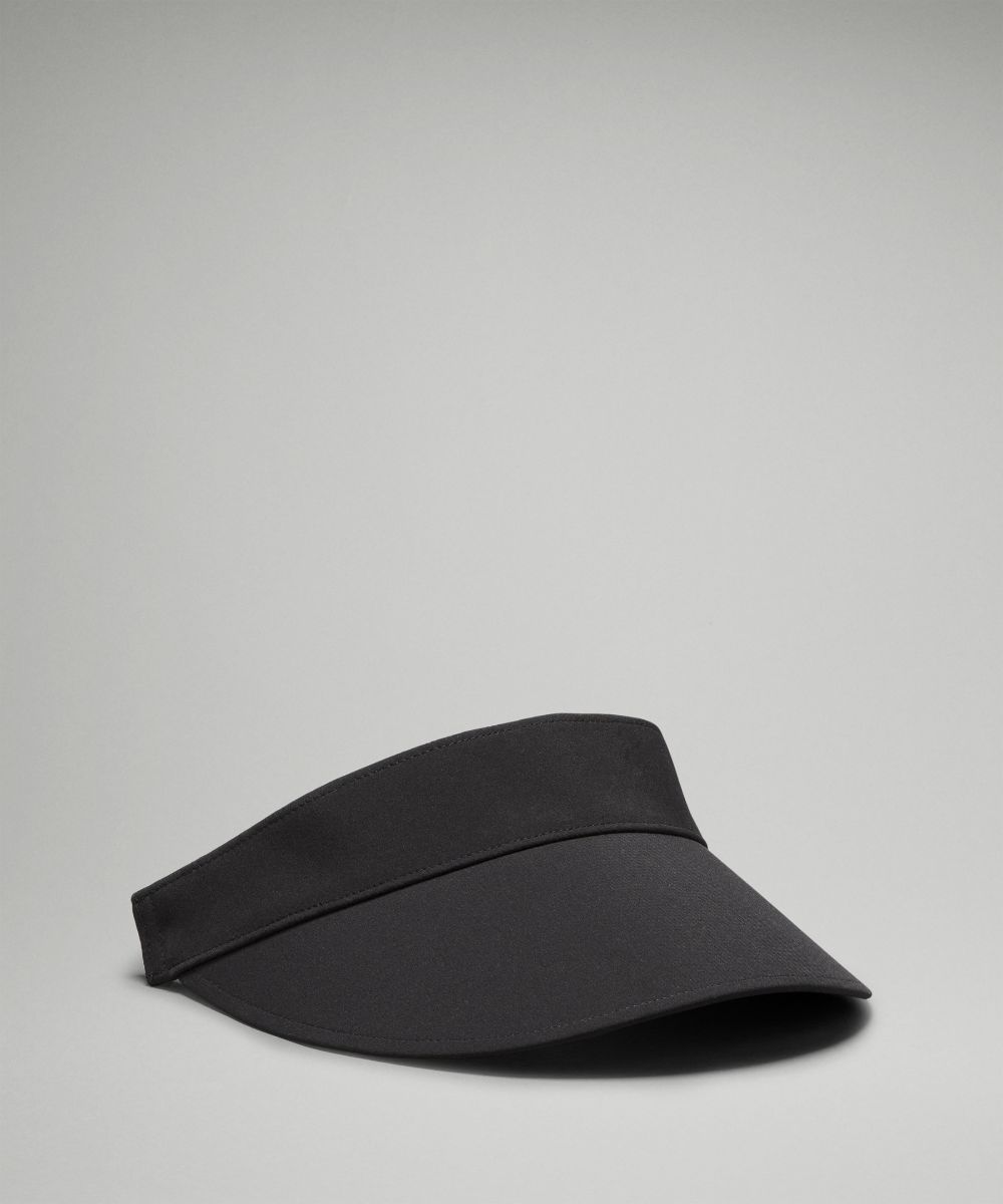 White wide band running visor, front view on white background