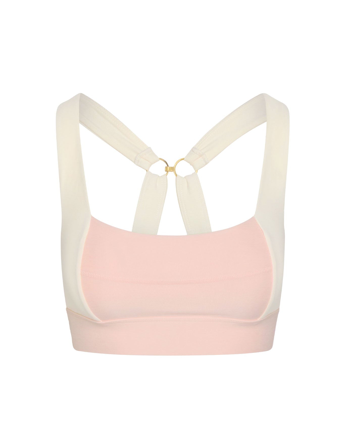 Pink sports bra with beige straps on a white background