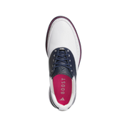 Golf shoe with white sole, navy side panel, and pink boost area on a light gray background