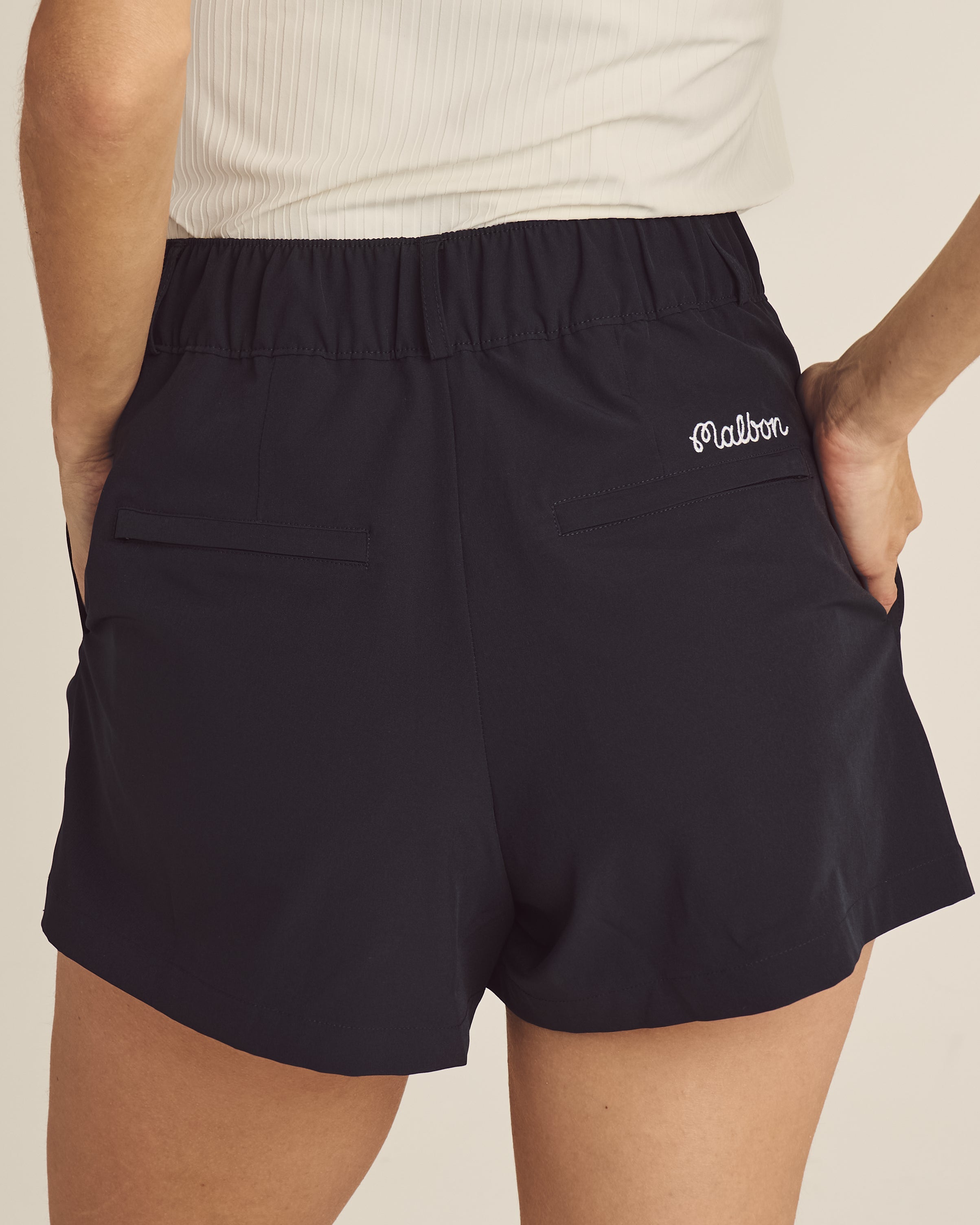 Model wearing Malbon Solene Short
