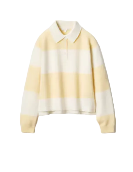 Yellow and white striped sweater on a light gray background