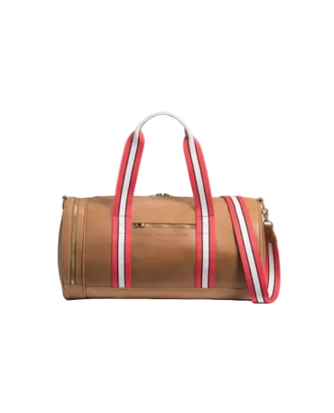 Brown duffel bag with red and white striped handles on a beige background