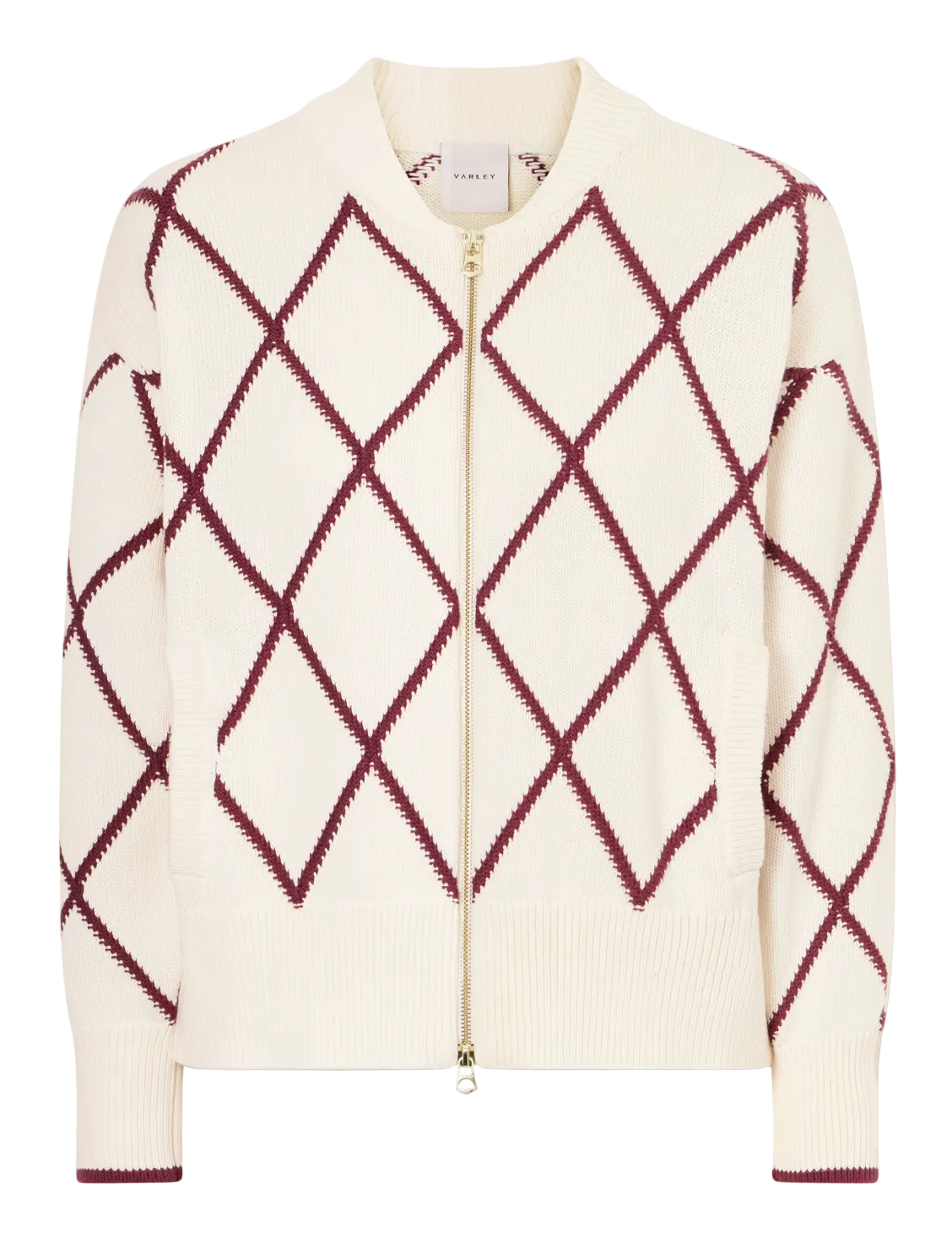 Cream-colored sweater with red diamond pattern on a white background