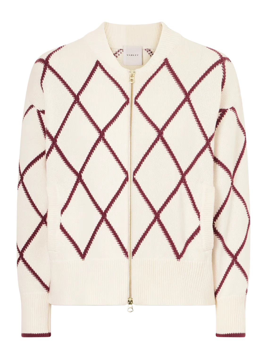 Cream-colored sweater with red diamond pattern on a white background
