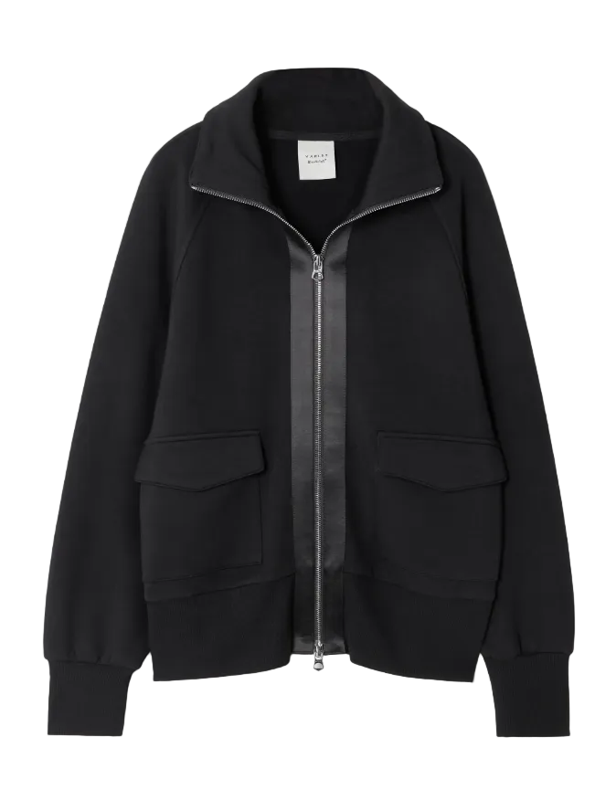 Black jacket with a zipper on a light gray background
