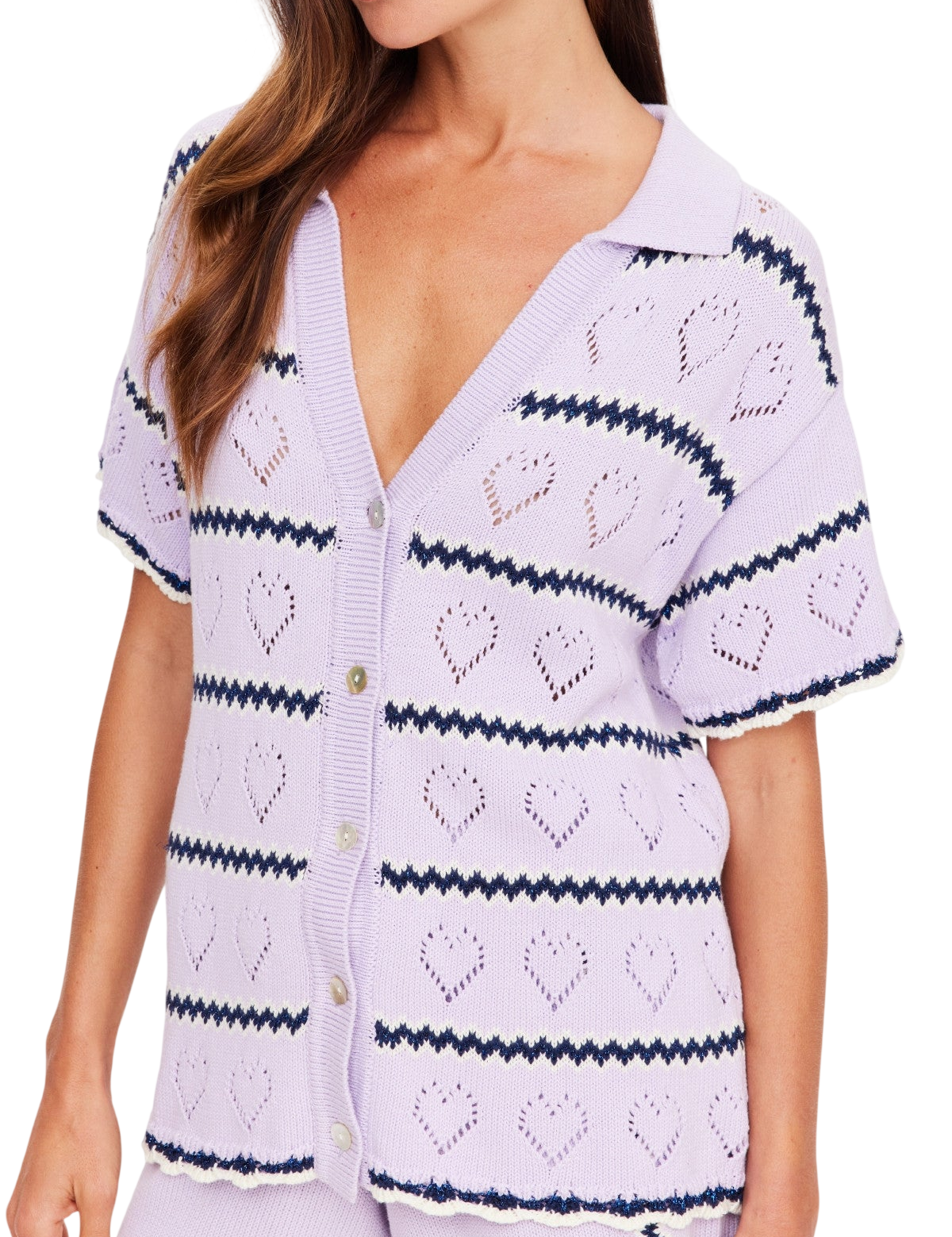 Model wearing The Upside Serve Travel Top in purple