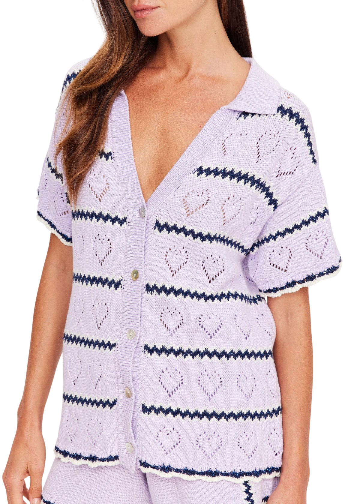 Model wearing The Upside Serve Travel Top in purple