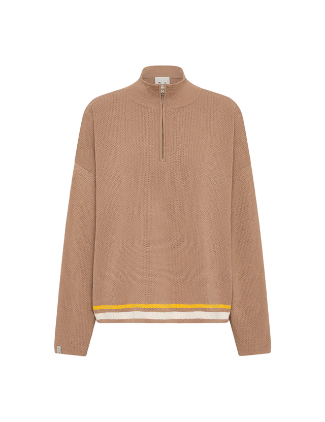 Model wearing The Upside Veneto Carter Zip Top in brown