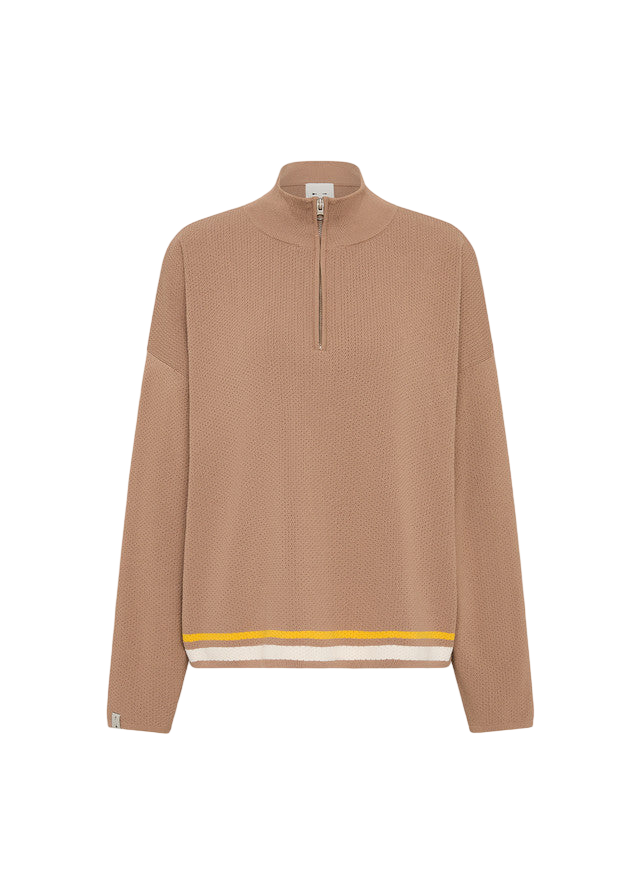 Model wearing The Upside Veneto Carter Zip Top in brown