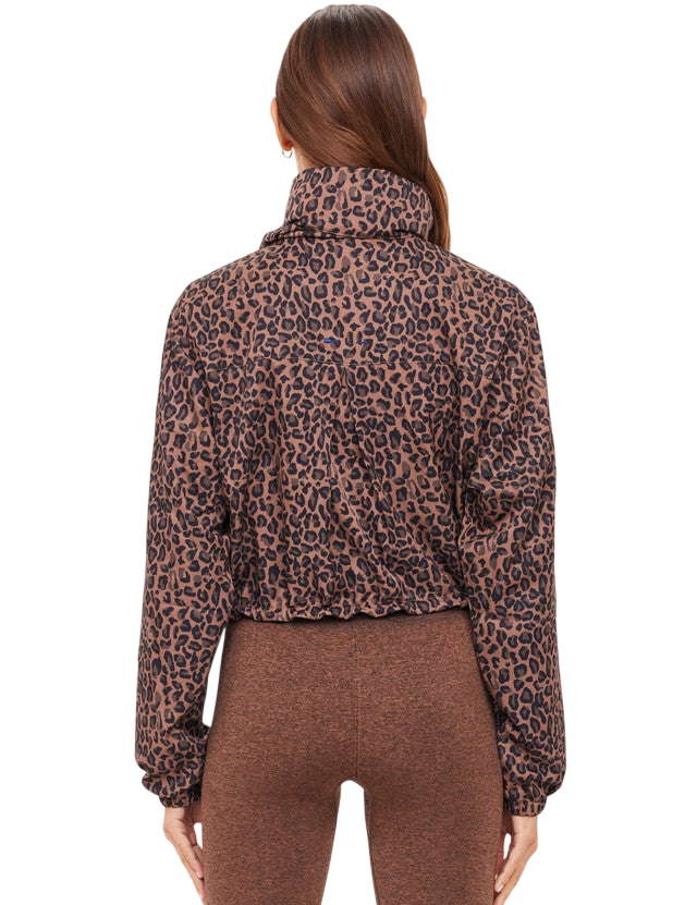Model wearing The Upside Ludlow Ace Shell Jacket in animal print