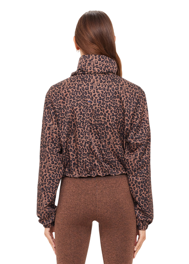 Model wearing The Upside Ludlow Ace Shell Jacket in animal print