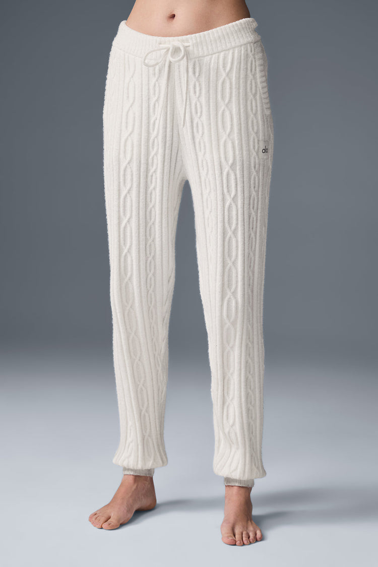 Model wearing Alo Yoga Cable Knit Winter Bliss Pant in ivory