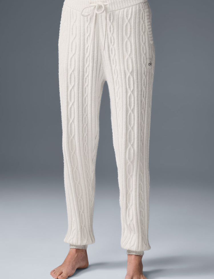 Model wearing Alo Yoga Cable Knit Winter Bliss Pant in ivory