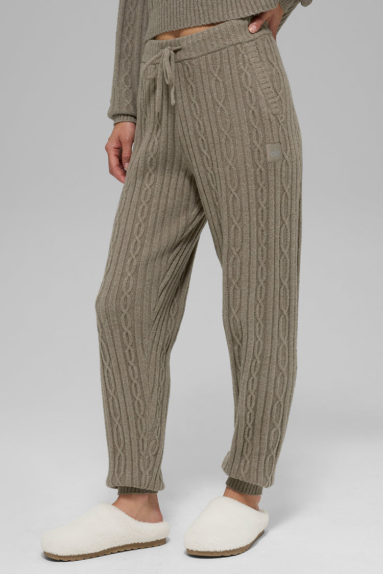 Model wearing Alo Yoga Cable Knit Winter Bliss Pant in sage
