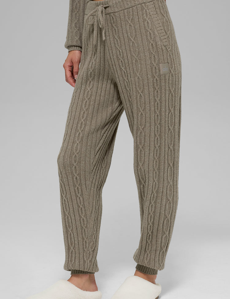 Model wearing Alo Yoga Cable Knit Winter Bliss Pant in sage