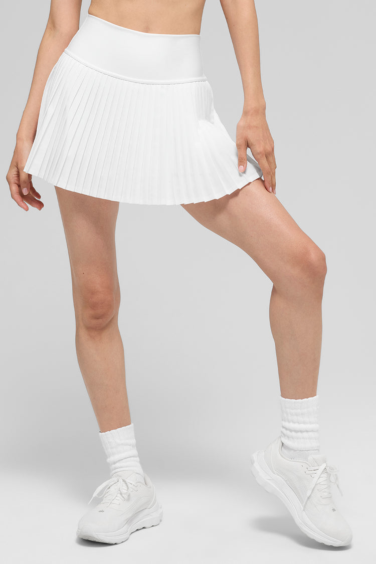 Model wearing Alo Yoga Grand Slam Tennis Skirt