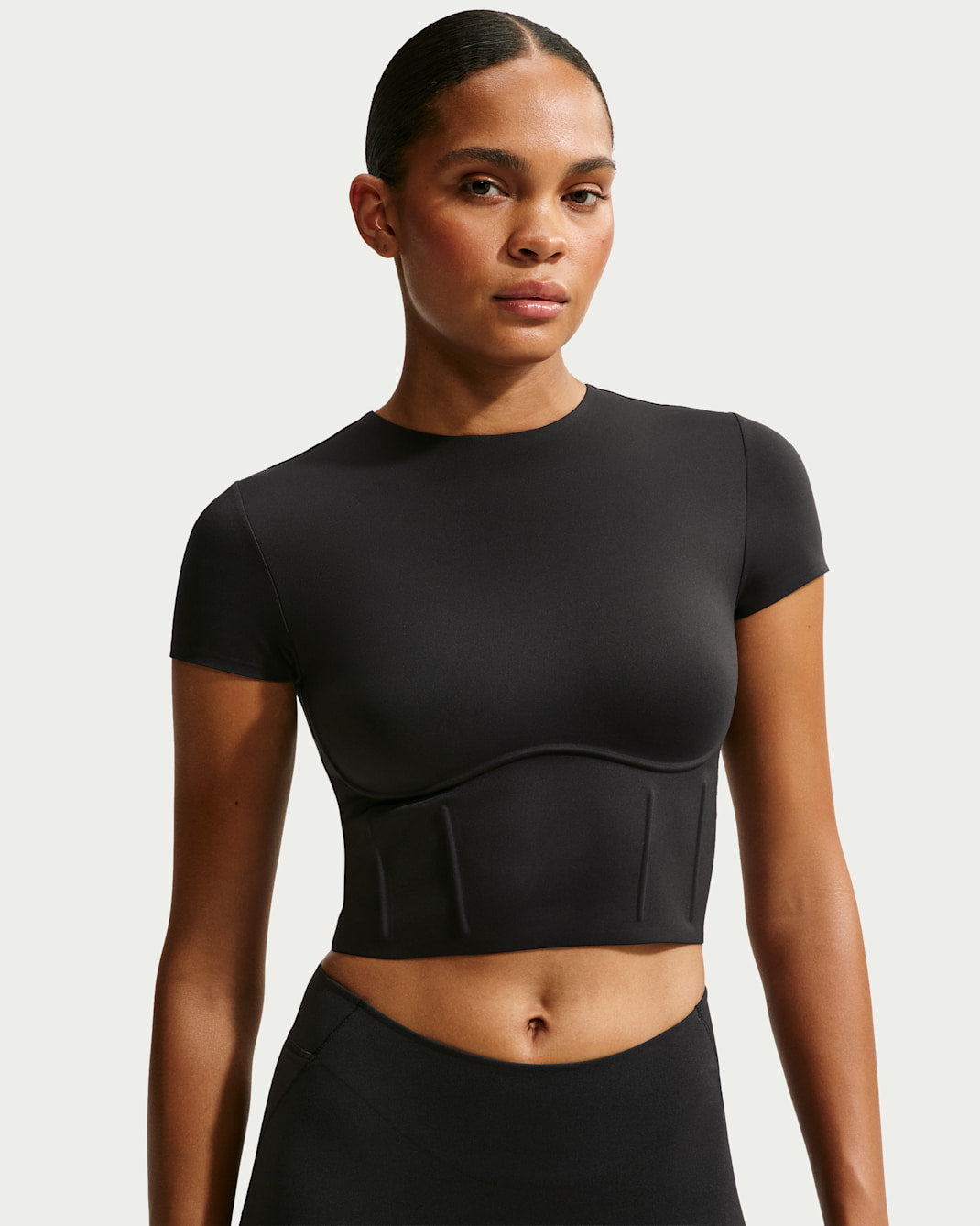 Cream matte corset cropped top, front view on white background