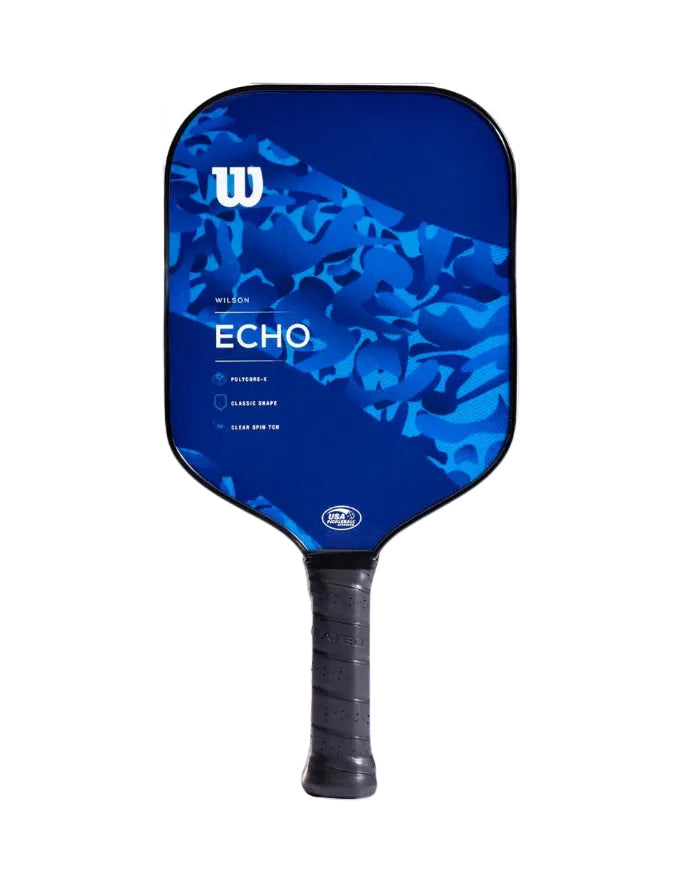 Blue pickleball paddle with 'Wilson' branding on a white background
