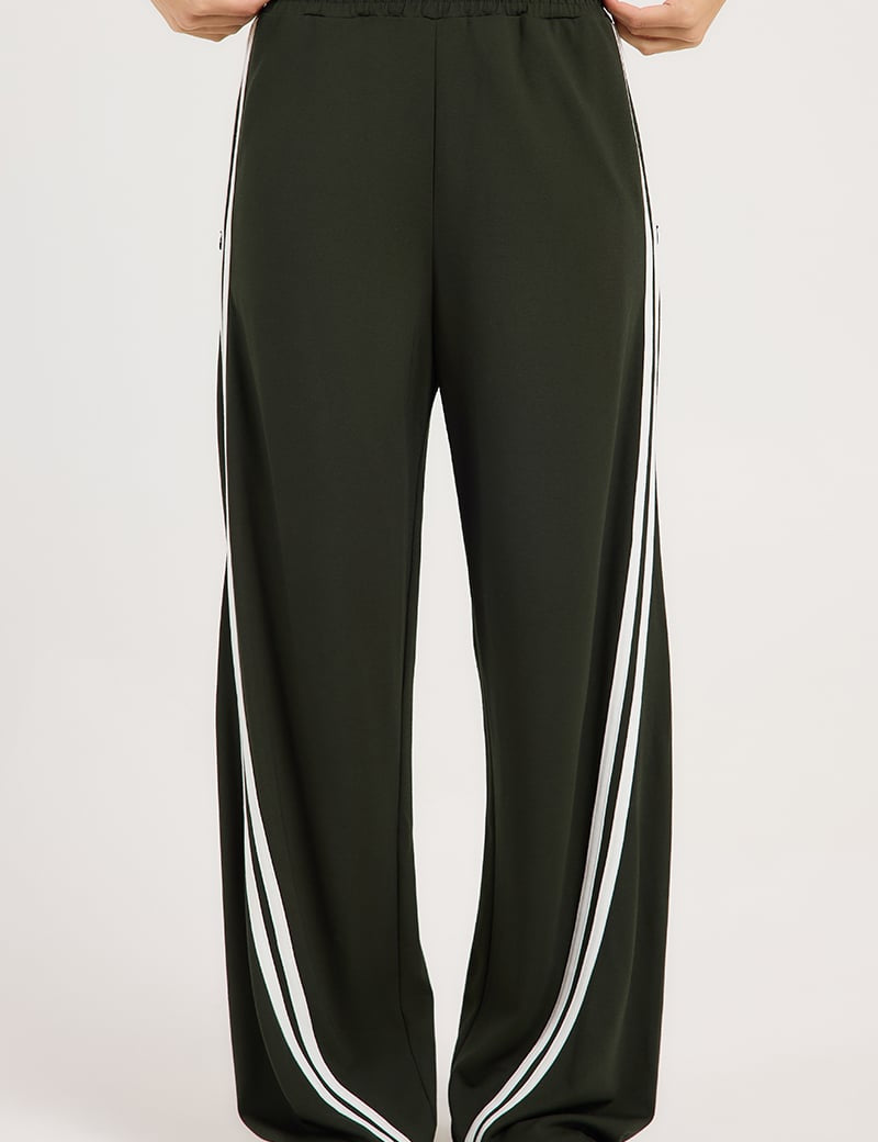 Model wearing Ena Pelly Valentina Stripe Pant