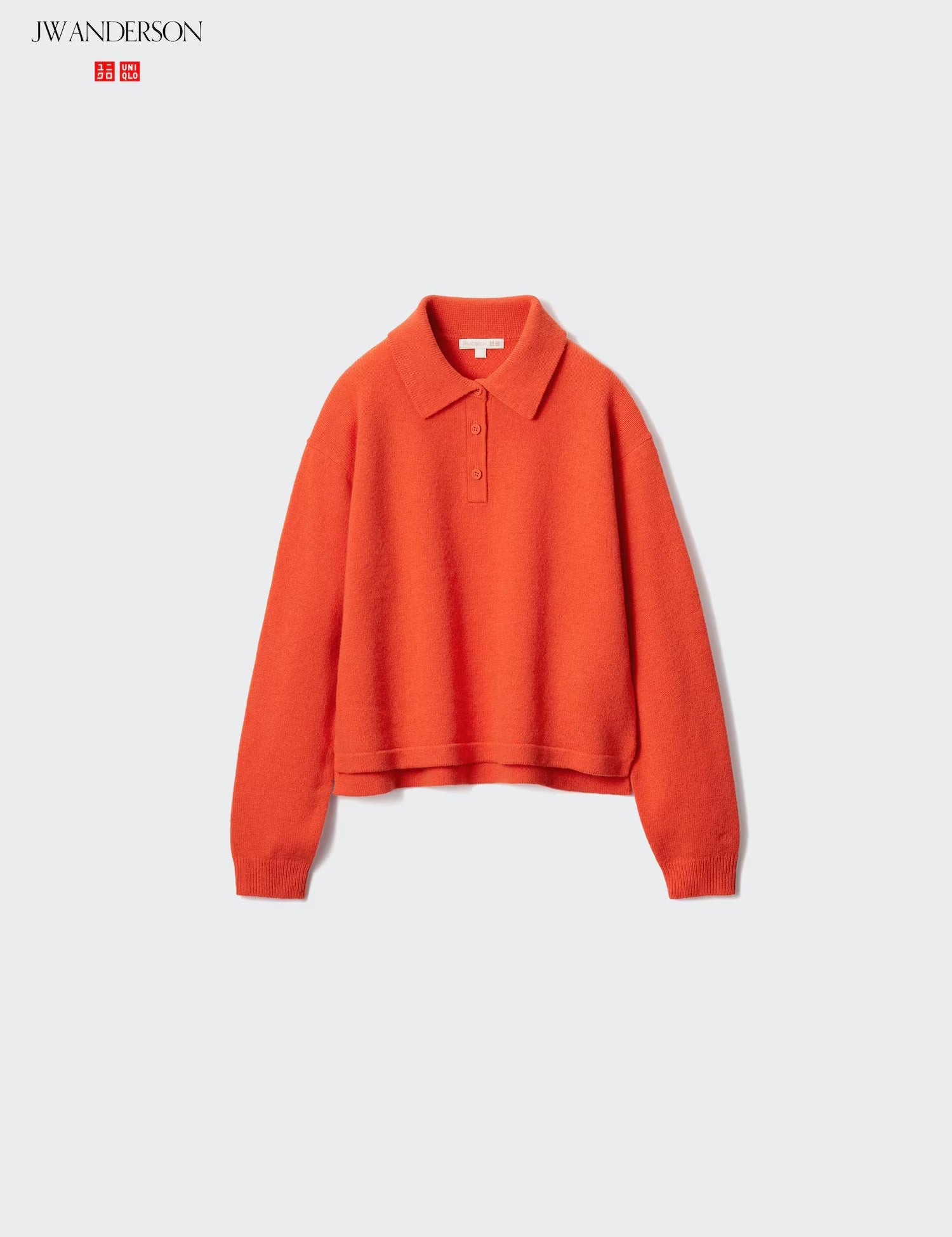 Orange sweater with a collar on a white background, featuring the JW Anderson logo.