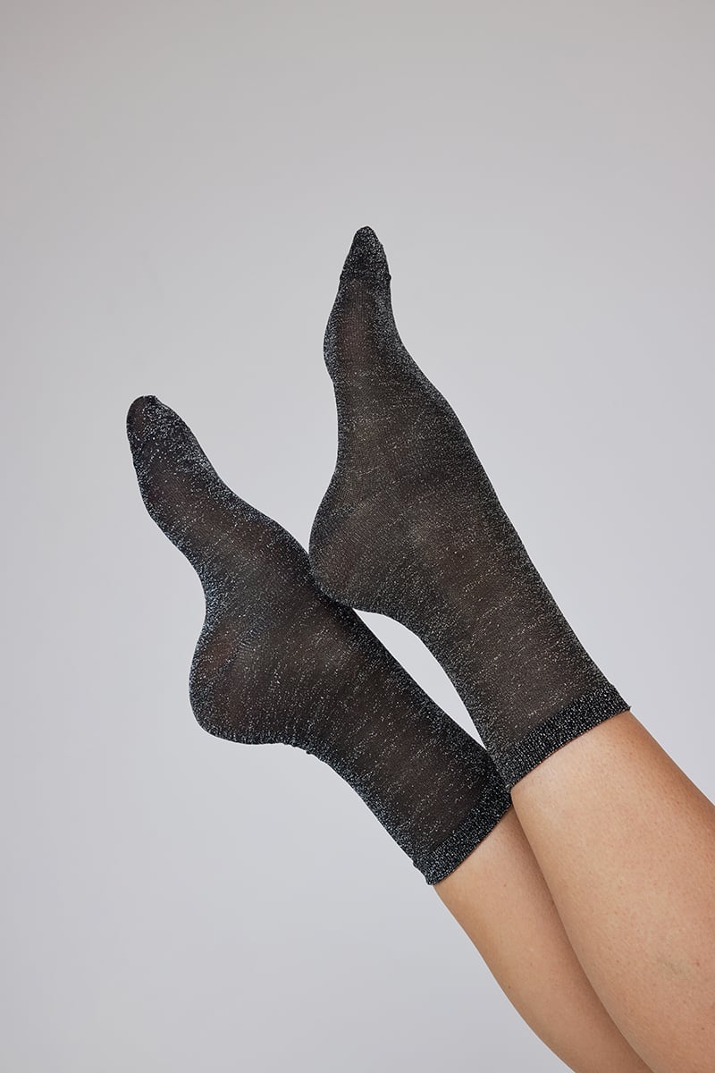 Stylerunner Sparkle Sock laid flat on a white background