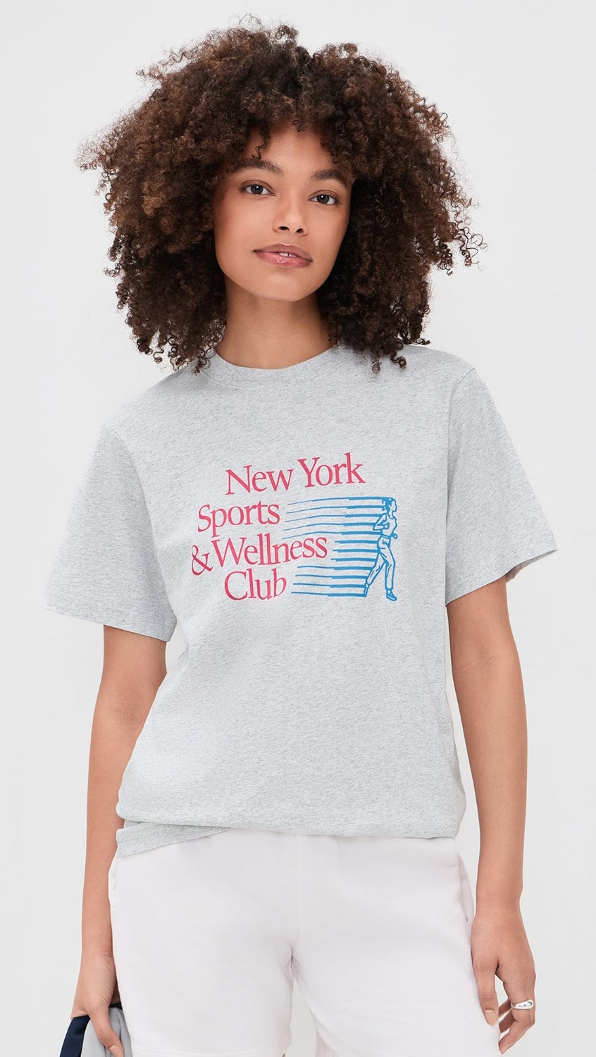 Model wearing Sporty & Rich New York Motion T-Shirt