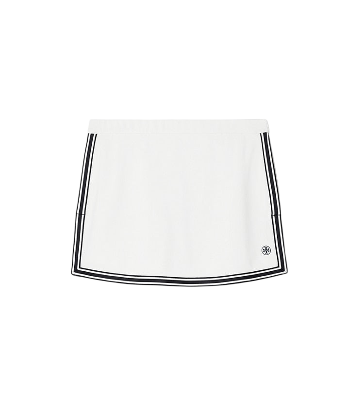 White tech pique tennis skirt, front view on white background
