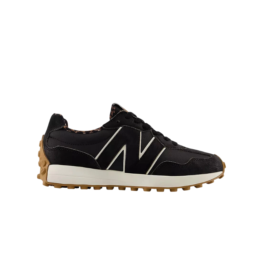 New Balance 327 Golf in black on a white background